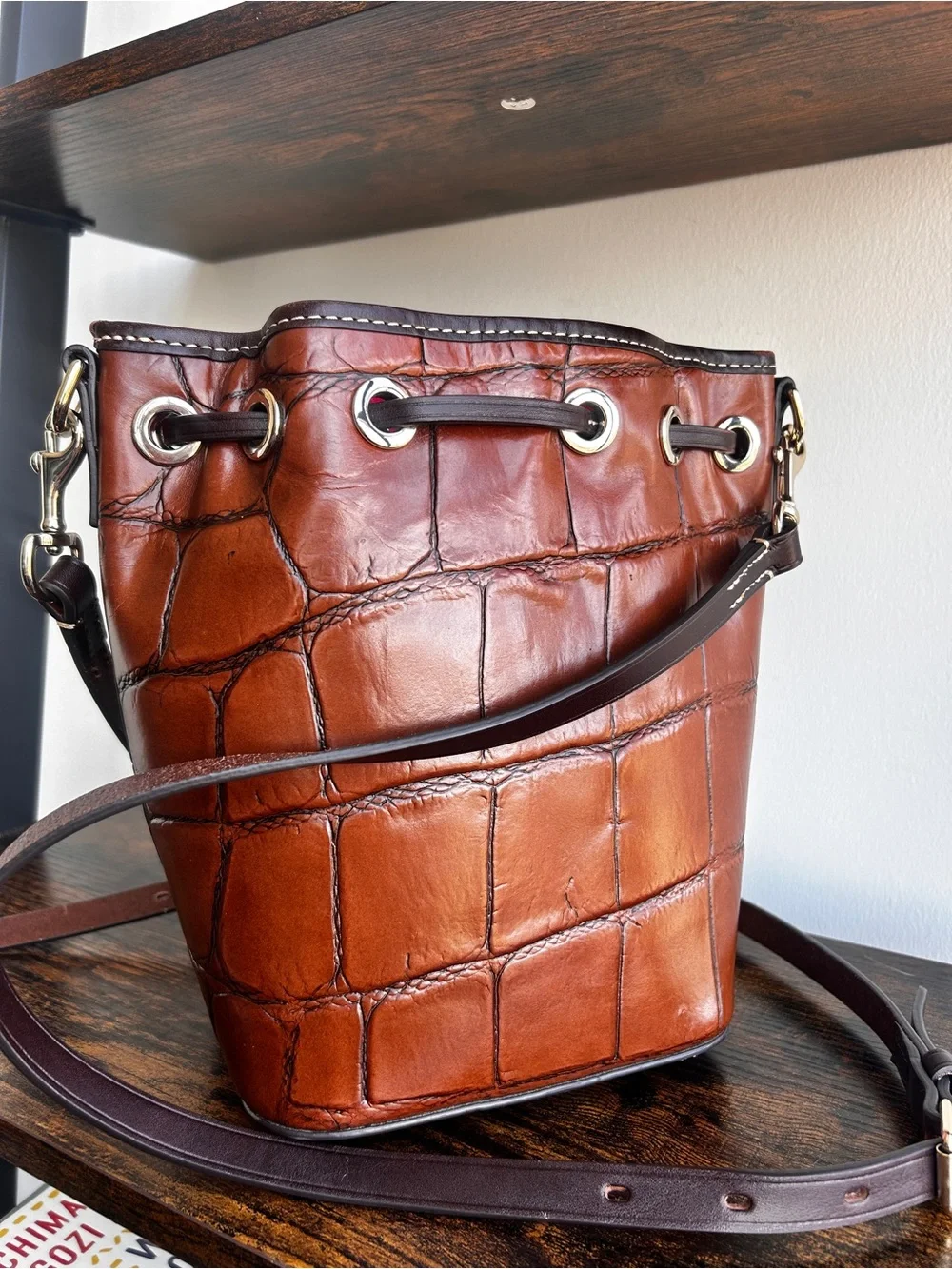 Dooney & Bourke Croc Embossed Leather Drawstring Bucket Crossbody Cognac